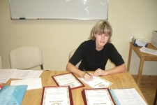 Подготовка дипломов к торжественной части.